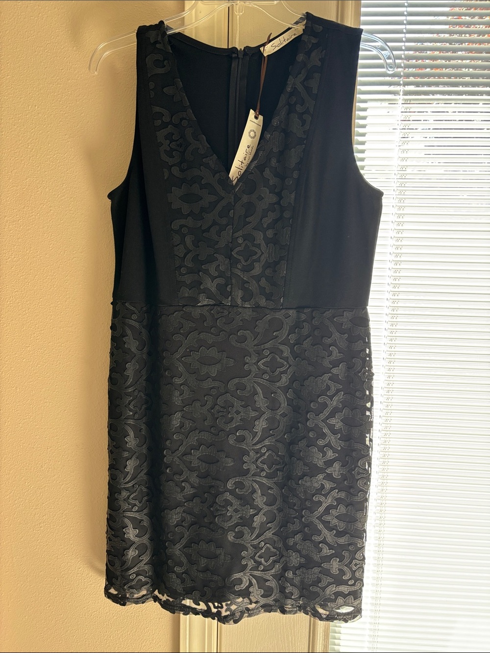 Solitaire Black Sleeveless V‑Neck Lace Overlay Mini Dress